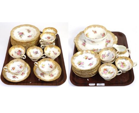 A Hammersley & Co gilt highlighted and floral painted part tea service (two trays) 