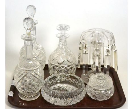 A pair of cut glass decanters, one other, a heavy glass ashtray, a candlestick lustre etc 