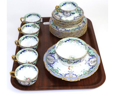 A Royal Crown Derby part tea service with floral decoration and gilt highlights, signed H Webster