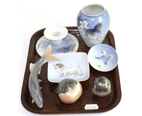 A group of Royal Copenhagen including two dishes, a vase, a candlestick, two bird models and a fish model 