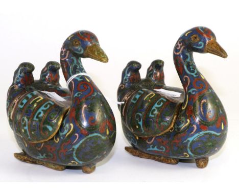 A pair of Chinese cloisonne enamel figures of ducks, as boxes, each with cover 