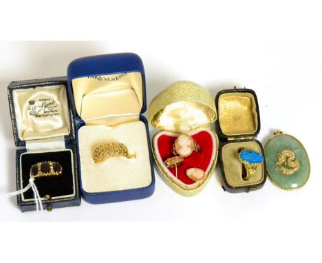 A 9ct gold jade pendant, a cameo ring and pair of cameo earrings, a carved plaque ring, a 9ct gold ring and a 9ct gold garnet