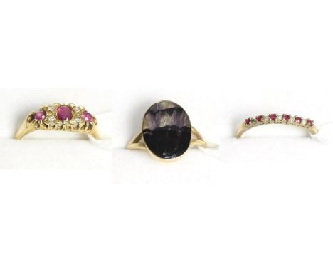 An 18ct gold ruby and diamond ring, a Blue John ring and a gem set ring (3) Ruby and diamond ring - Finger size P, 3.7g gross