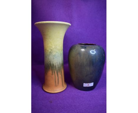 A mottle blue and beige vase having almost lustre like finish,marked Howsons 1913 to underside,and a 1931 dated Ruskin vase,s