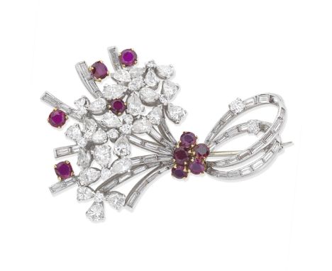RUBY AND DIAMOND SPRAY BROOCH, CIRCA 1950Circular-cut rubies, pear, baguette and brilliant-cut diamonds, one diamond deficien