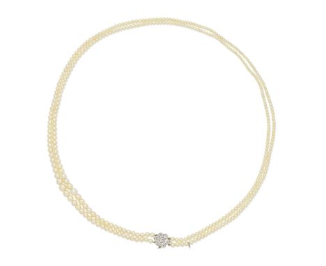 NATURAL PEARL NECKLACE WITH DIAMOND CLASP, CIRCA 1915The two rows of 2.2-6.4mm pearls, on an old brilliant-cut diamond clasp,