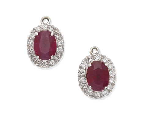 RUBY AND DIAMOND CLUSTER EARRINGSEach set with an oval-cut ruby and brilliant-cut diamonds, diamonds approx. 0.55ct total, pe
