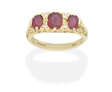 RUBY AND DIAMOND RING, 2004Oval-cut rubies and brilliant-cut diamonds, mounted in 18 carat gold, London hallmark,  ring size 