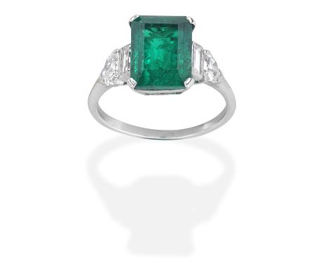 EMERALD AND DIAMOND RINGStep-cut emerald, fancy and baguette-cut diamonds, emerald approx. 3.75cts, diamonds very approx. 0.7