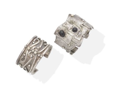 MICHAEL ALLEN BOLTON: GEMSET AND SILVER BANGLE, 1984 AND SILVER BANGLE, 19921st with cabochon-cut red gemstones, both with ma