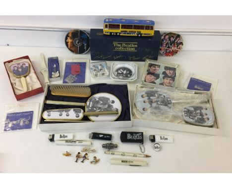 BEATLES MEMORABILIA. Large mixed lot to include 8 pin badges, 3 lighters, a John Lennon Imagine watch, 3 torches, Corgi Myste