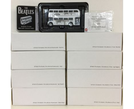 BEATLES CORGI TINS. Eight Corgi collectors 1/36 scale models in tins and original packaging to include 4 taxis and 4 Routemas