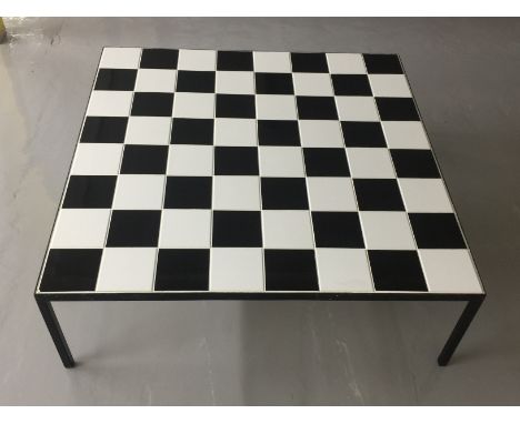 JOHN LENNON CHECKERBOARD TABLE. A large chessboard patterned table from John Lennon's home, Kenwood, in Weybridge, Surrey. Th