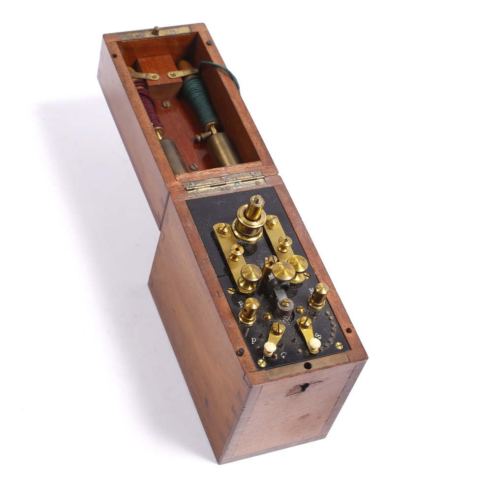 A Victorian electricshock machine cased in a wooden box, 13cm high