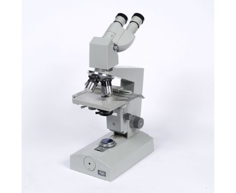 A Carl Zeiss Jena electric illuminated binocular microscope 41cm high