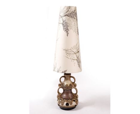 A 1970's stoneware lamp  with tall shade