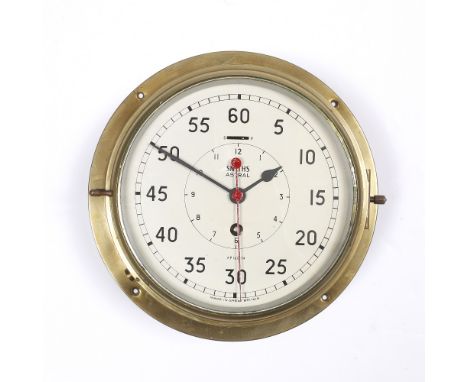A brass ships clock by Smiths, marked Astral, 27cm diameter