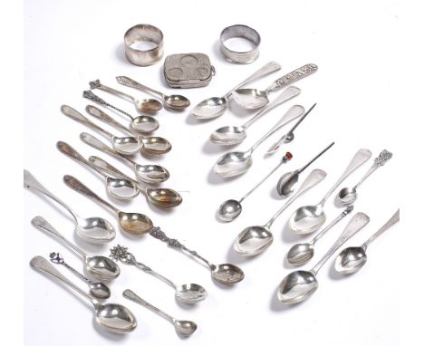 A collection of silver spoons a caddy spoon, napkin rings etc