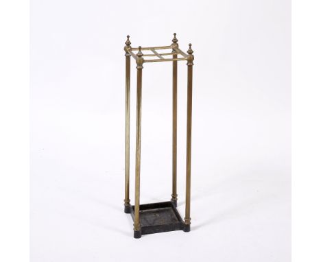 An Edwardian square brass stick stand 67cm high x 18cm across