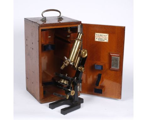 A Carl Zeiss Jena monocular microscope with wooden case and further lenses