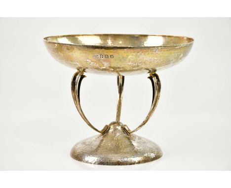 GEORGE EDWARD &amp; SONS; a George V hallmarked silver Arts and Crafts style comport with planished decoration, the upper bow