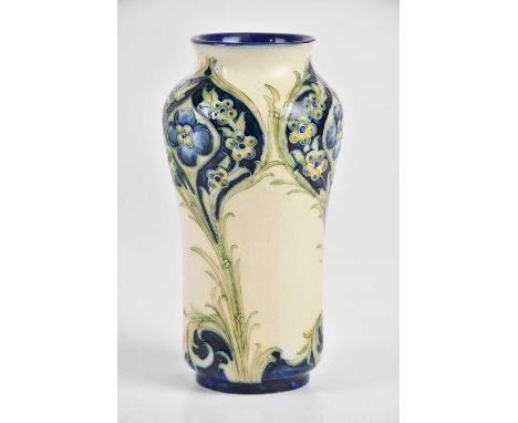 WILLIAM MOORCROFT FOR JAMES MACINTYRE &amp; CO; a Florian ware vase in the 'Forget-Me-Not' pattern, green signature to unders