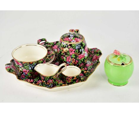 ROYAL WINTON; a 'Chelsea Chintz' pattern breakfast set, width 25.5cm, with a green ground preserve pot and cover (2).