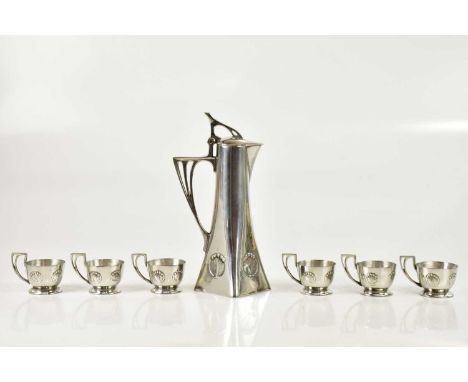 ALBERT KOHLER (WMF); an Arts &amp; Crafts pewter drinking set comprising ewer  and six cups relief decorated with stylised mo