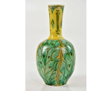 ANNIE BEAUMONT AND ANNIE SMITH FOR DELLA ROBBIA; an art pottery vase with incised floral decoration, height 22cm. Condition R