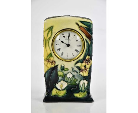 MOORCROFT; a 'Lamia' pattern mantel clock, height 16cm.Condition Report: Silver line through the base which indicates seconds