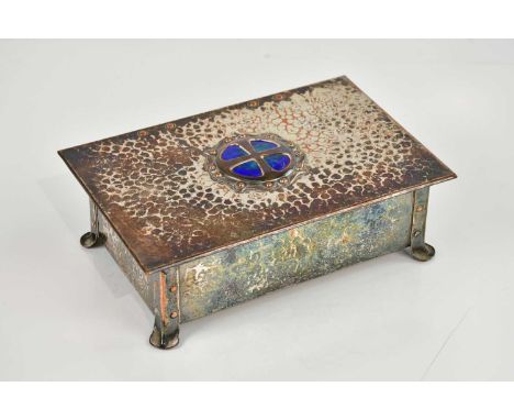 An Arts &amp; Crafts planished silver plated casket, with green and blue enamel cabochon, and cedar wood lined interior, widt