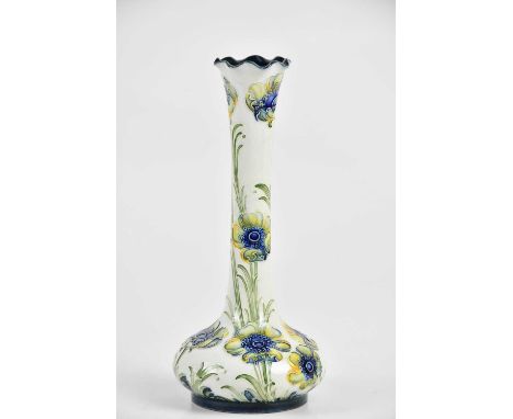 WILLIAM MOORCROFT FOR JAMES MACINTYRE &amp; CO; a Florian ware vase of square form with elongated neck and wavy rim, in the '