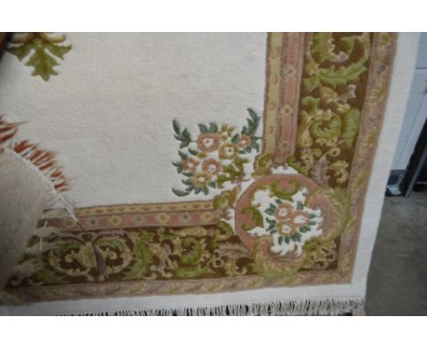 An approx 10'3" x 7'2" large floral patterned carpet