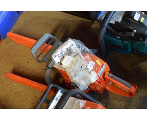 A Huskavaner petrol powered chainsaw