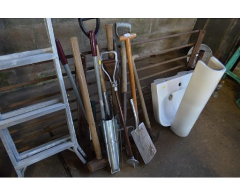 A quantity of long handled gardening tools and a shooting stick