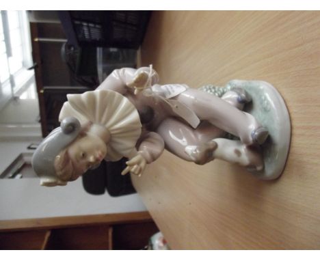 Nao figurine, child clown with puppy