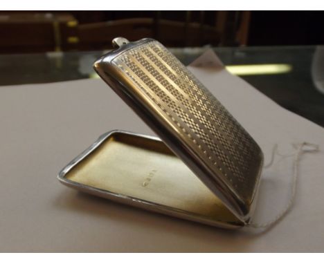 Art deco silver card case, engine turned with vacant cartouche, Birmingham hallmark