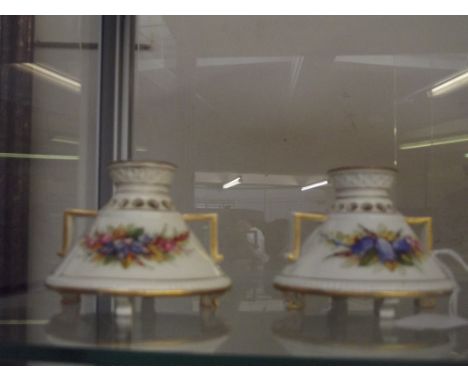 Pair of Royal Worcester vases, squat form, restoration to the rim of one 