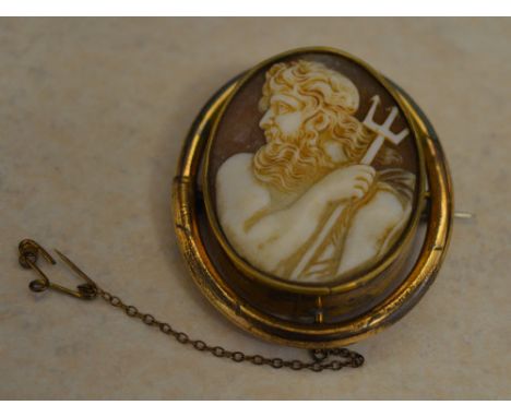 Yellow metal cameo brooch with safety chain, depicting Poseidon/Neptune holding a trident