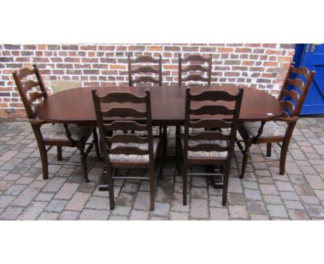 Oak draw leaf dining table and six ladder back chairs inc 2 carvers (extending to 214 cm W 90 cm)