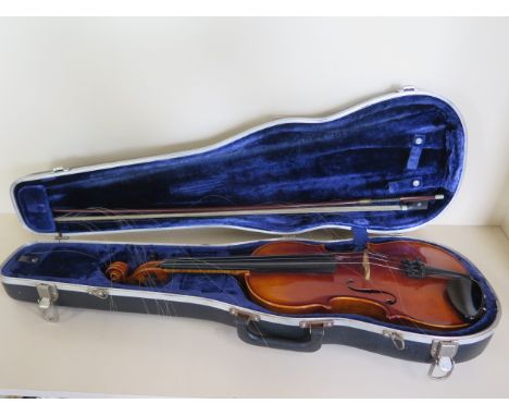 A German violin with a 14 1/4 inch, two piece back, label Ton-Klar, the Dancla William Lewis Chicago with an Otto Jos Klier b