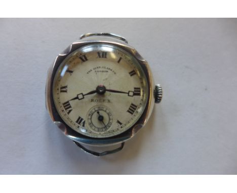 A ladies silver Rolex 15 jewel manual wind wristwatch, the dial signed The Alex Clark co London, 27mm wide including button, 