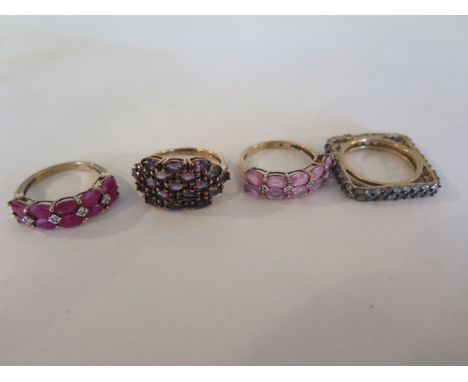 Four 9ct gold dress rings, set with rubies, amethyst, garnet and green stones, one stone missing, total weight approx 13.2 gr