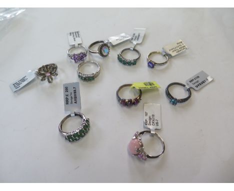 Ten silver dress rings, stones include diamond, amethyst, tanzanite etc 