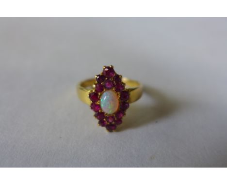 A yellow gold ruby and opal cluster ring, size K, approx 4 grams, not hallmarked, but tests to approx 18ct, generally good co