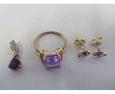 A pretty 9ct gold amethyst ring, size P, 9ct gold amethyst and diamond pendant and pair of 18ct gold and amethyst stud earrin