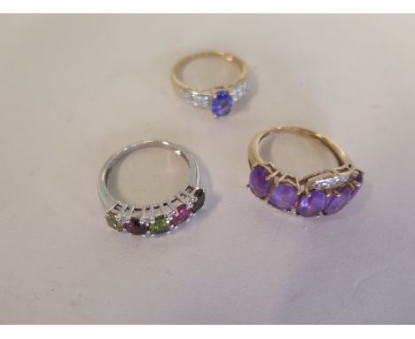 Two 9ct and a 10ct gold ring including a 9ct white gold and three colour tourmaline ring, size N 1/2 - 9ct gold and amethyst 