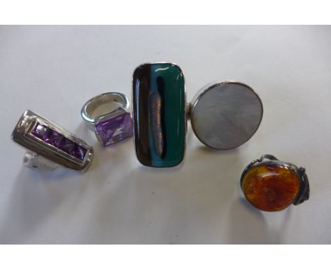 Five various large stone set silver rings including amber,  amethyst etc 