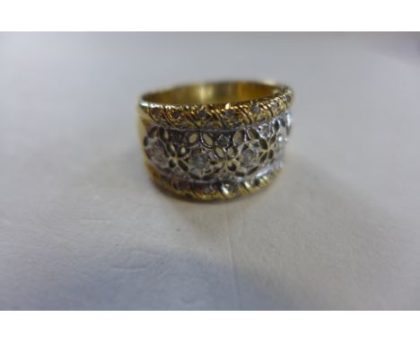 An 18ct gold diamond ring, size R, approx 8 grams, some bending and small usage marks 