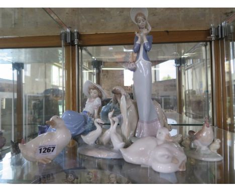 Lladro figure of a lady with Afghan hound and five pieces of Nao 